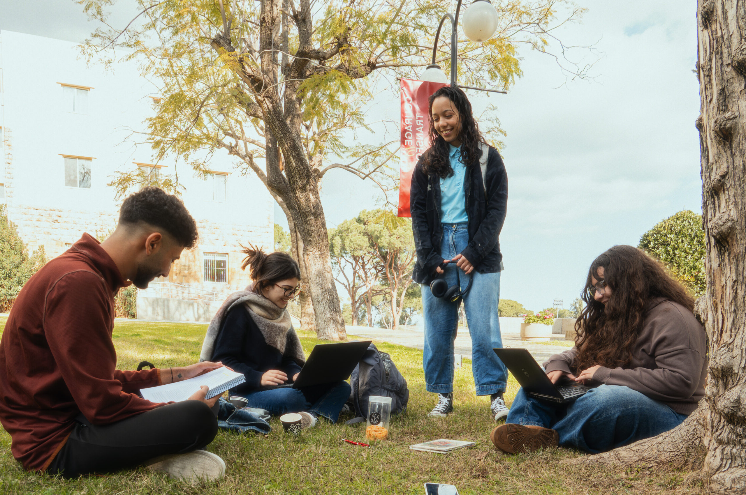 MEU students studying together outdoors on campus