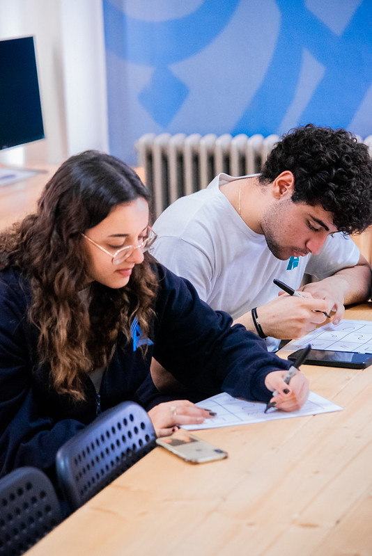 MEU students working on a creative classroom activity