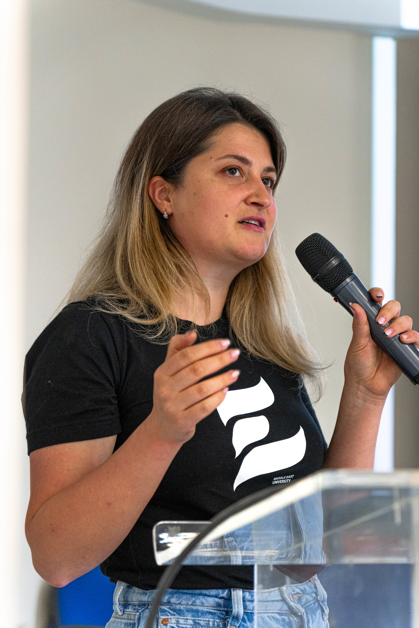Speaker at a Middle East University event, illustrating communication and future professional pathways